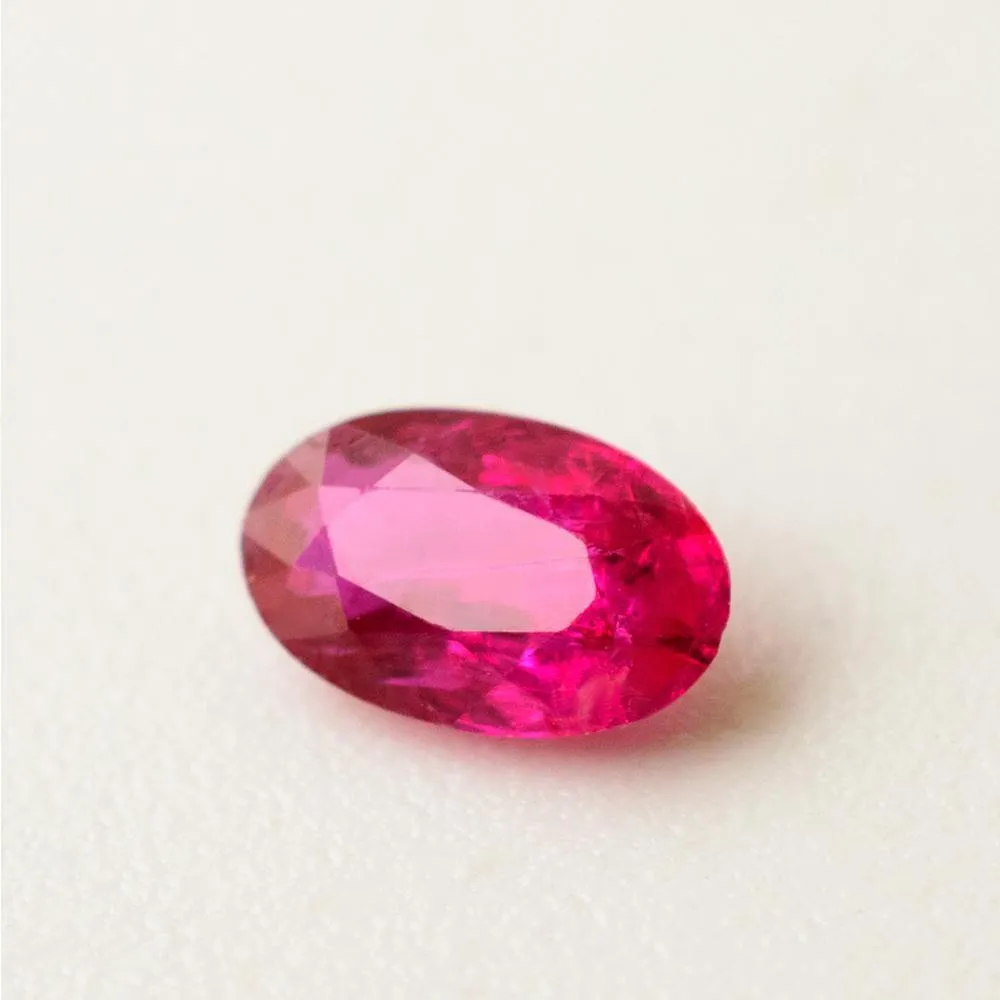 0.46 Carat Oval Purplish Red Ruby Gemstone