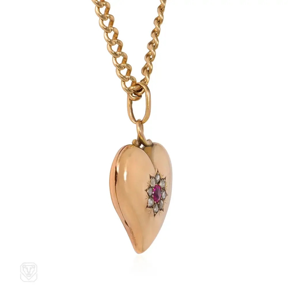 Antique gold and ruby witch's heart pendant locket