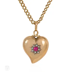 Antique gold and ruby witch's heart pendant locket