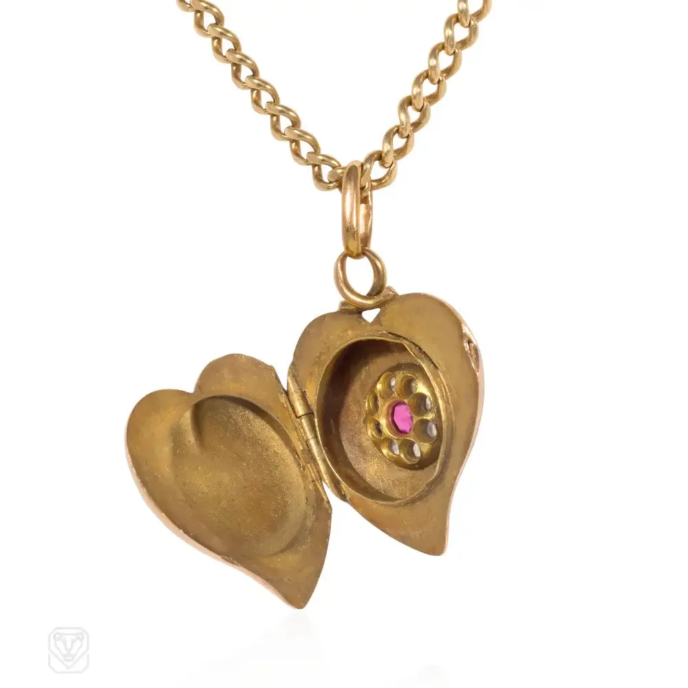 Antique gold and ruby witch's heart pendant locket