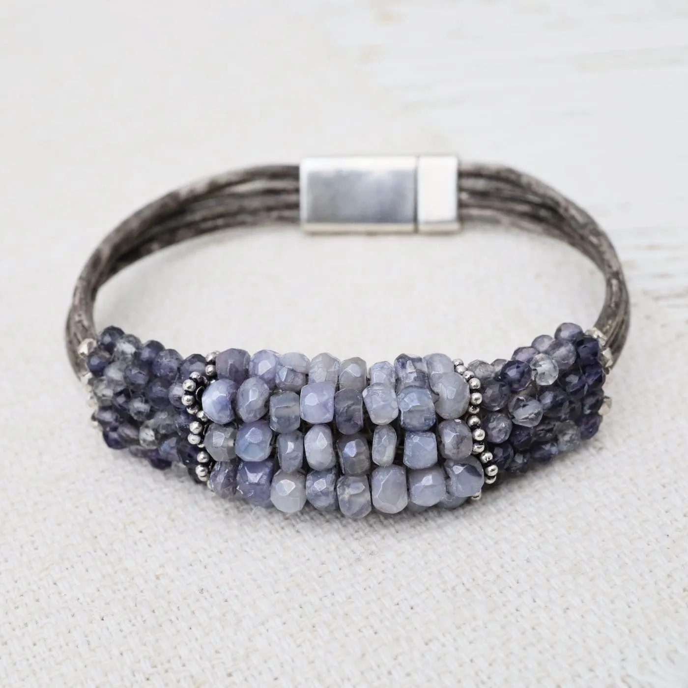 Hand Stitched Banded Iolite with Silver Trim on Multi Strand Leather Bracelet